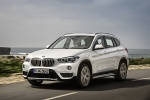 2019 BMW X1 xDrive28i in Alpine White - Driving Front Left Three-quarter View